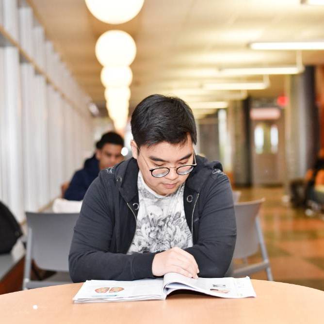 student studying at table